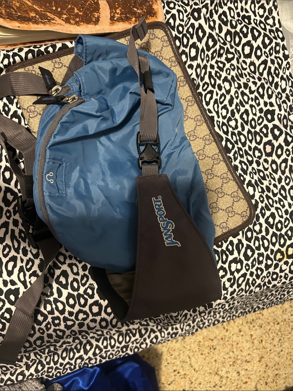 Jansport Blue Sling wait bag with Gray Straps
